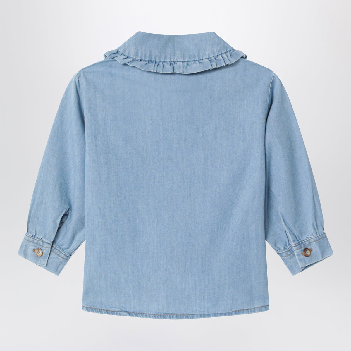 Light blue denim shirt with rounded collar