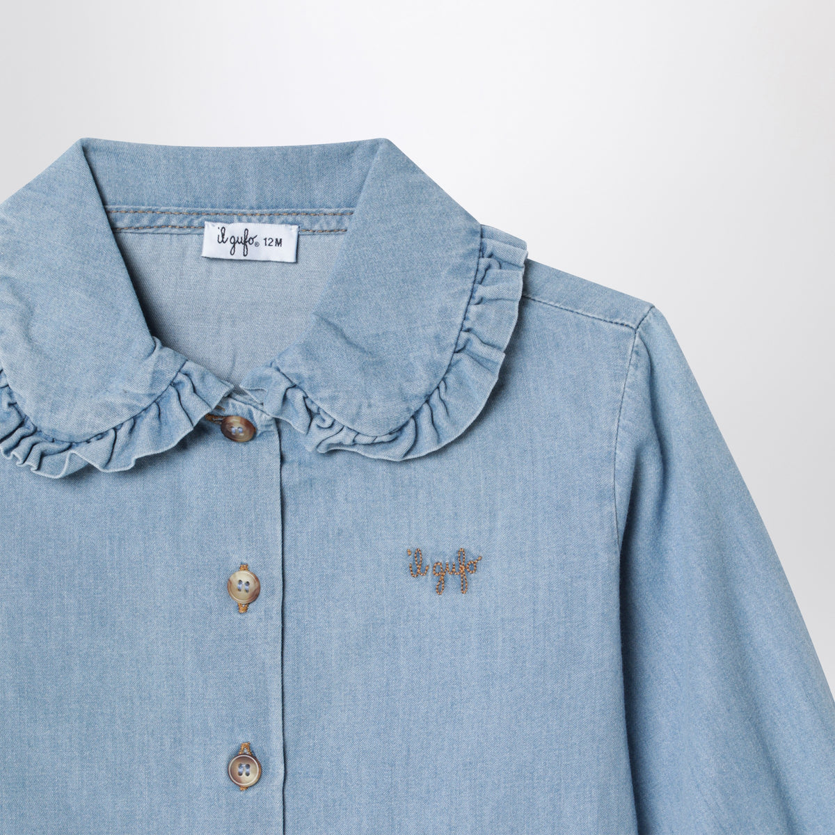 Light blue denim shirt with rounded collar