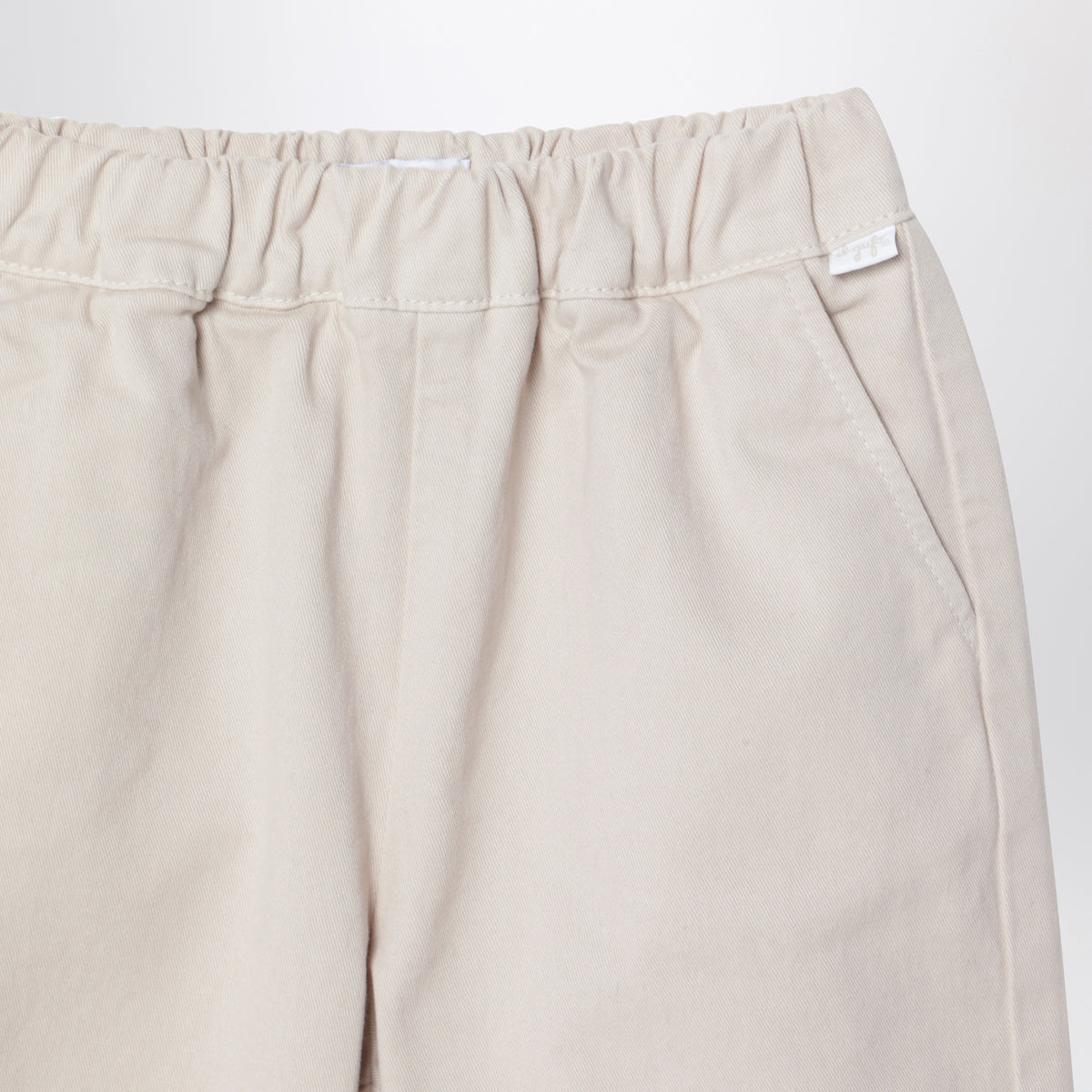 Pantalone in cotone beige chiaro con vita elasticizzata