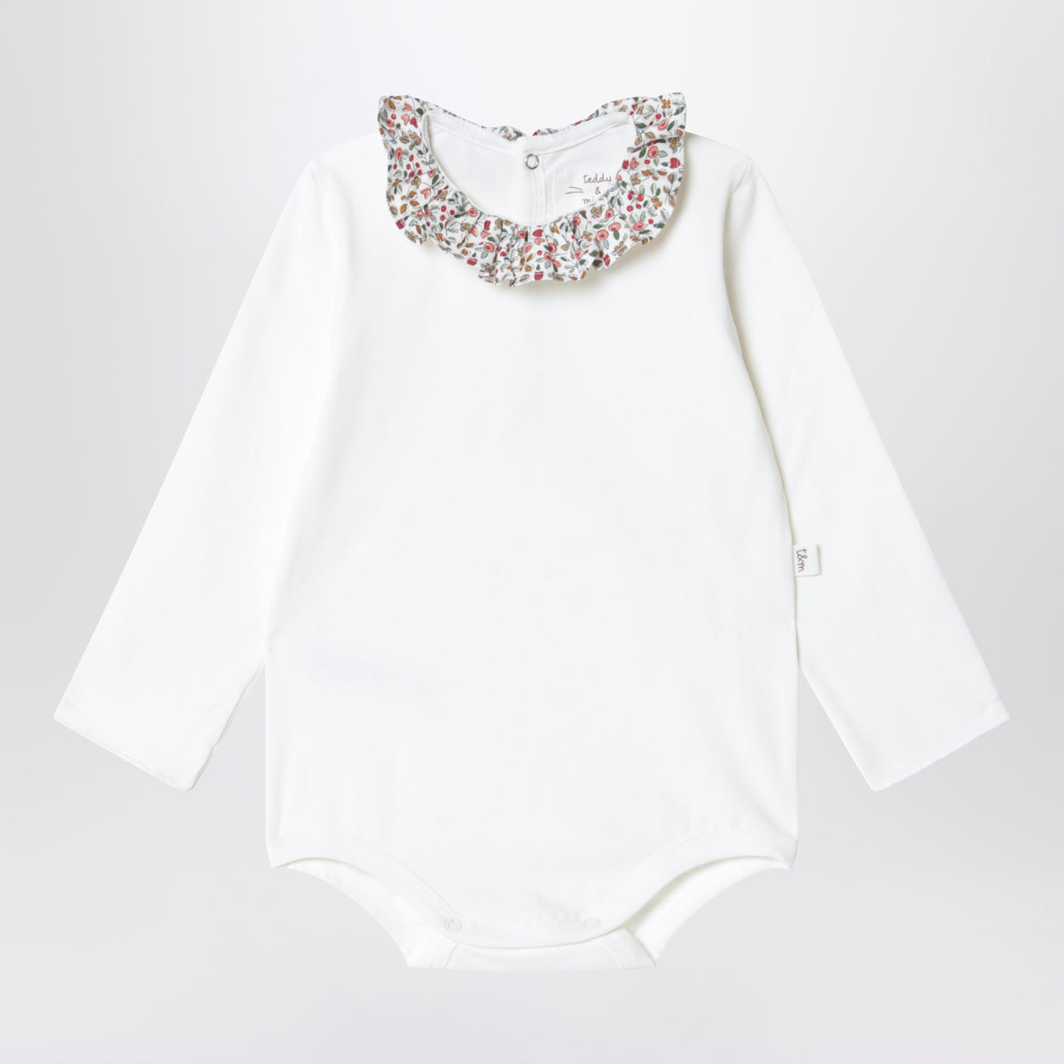 Body en jersey de coton laiteux et rose à col volanté