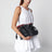 Mittelgroße Flamenco Pochette im Layer-Look aus dunkelblauem Leder