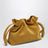 Medium ochre Flamenco bag in suede
