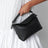 Small black Puzzle Edge bag
