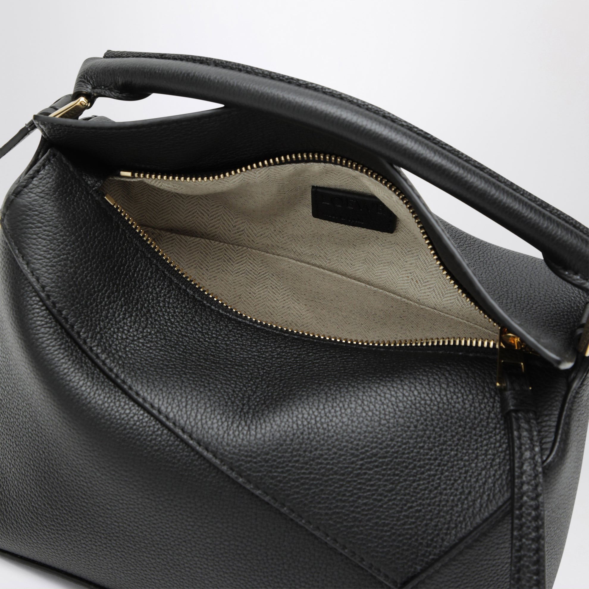 Small black grained leather Puzzle Edge bag