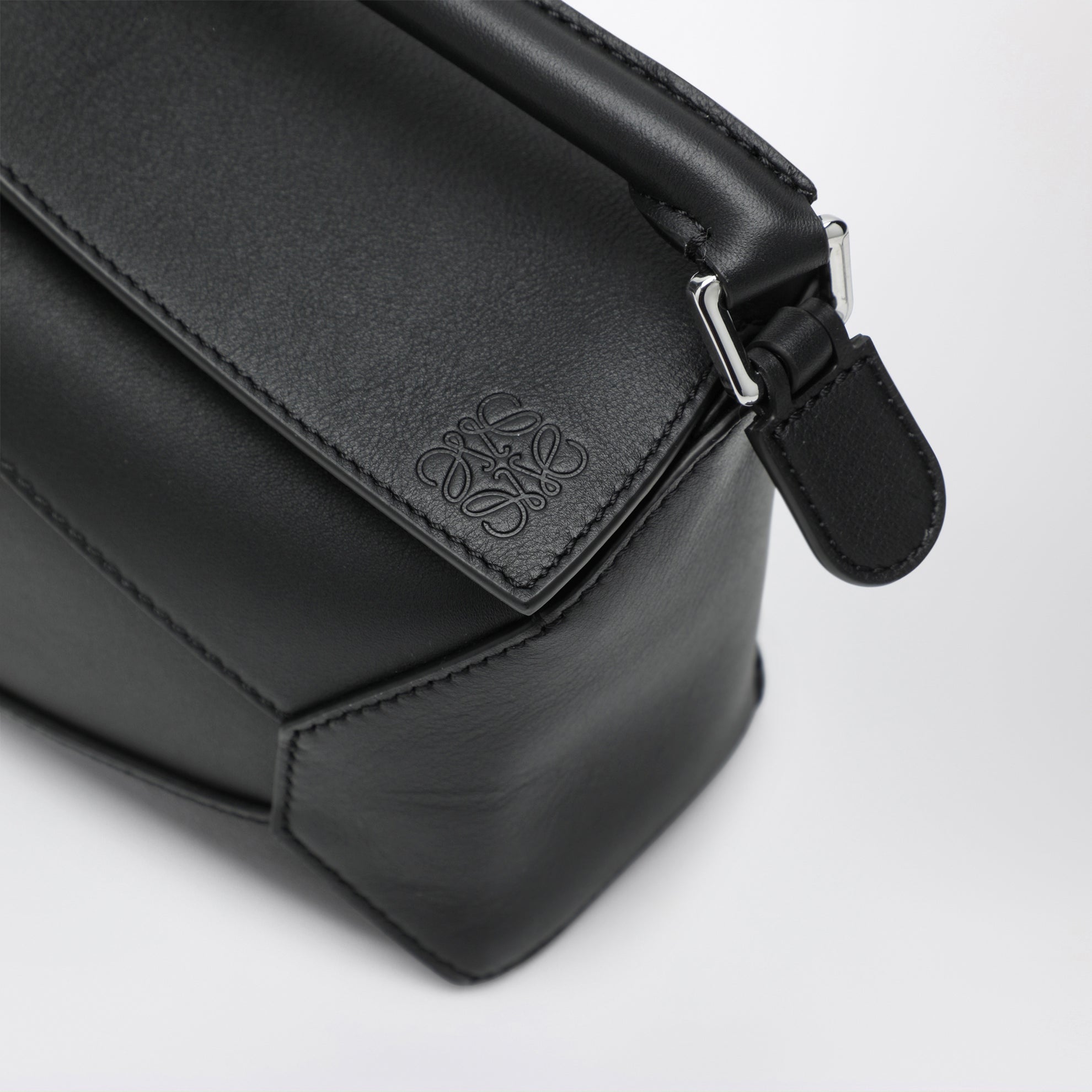Mini Puzzle Edge bag in black leather