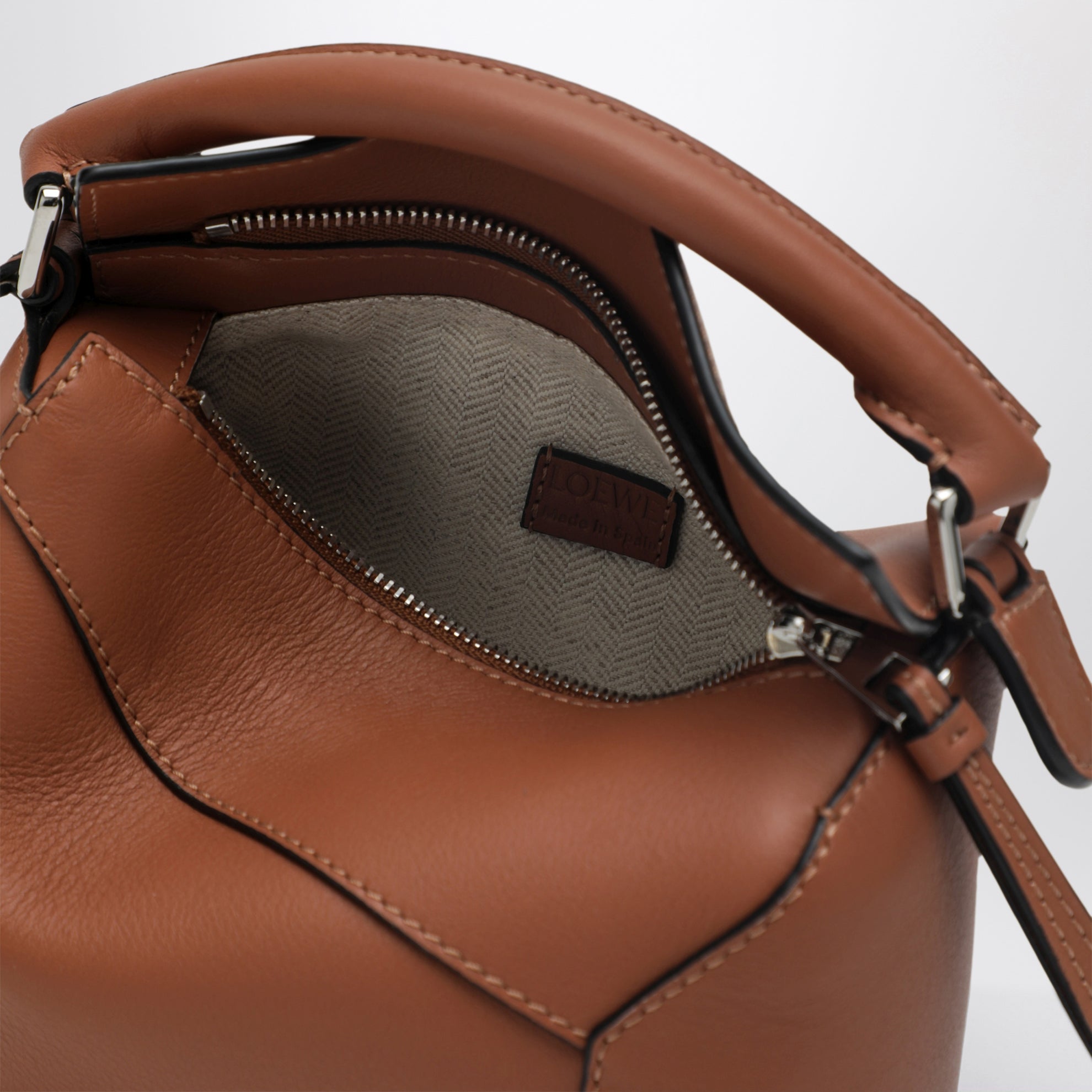 Borsa Puzzle Edge mini marrone in pelle granata