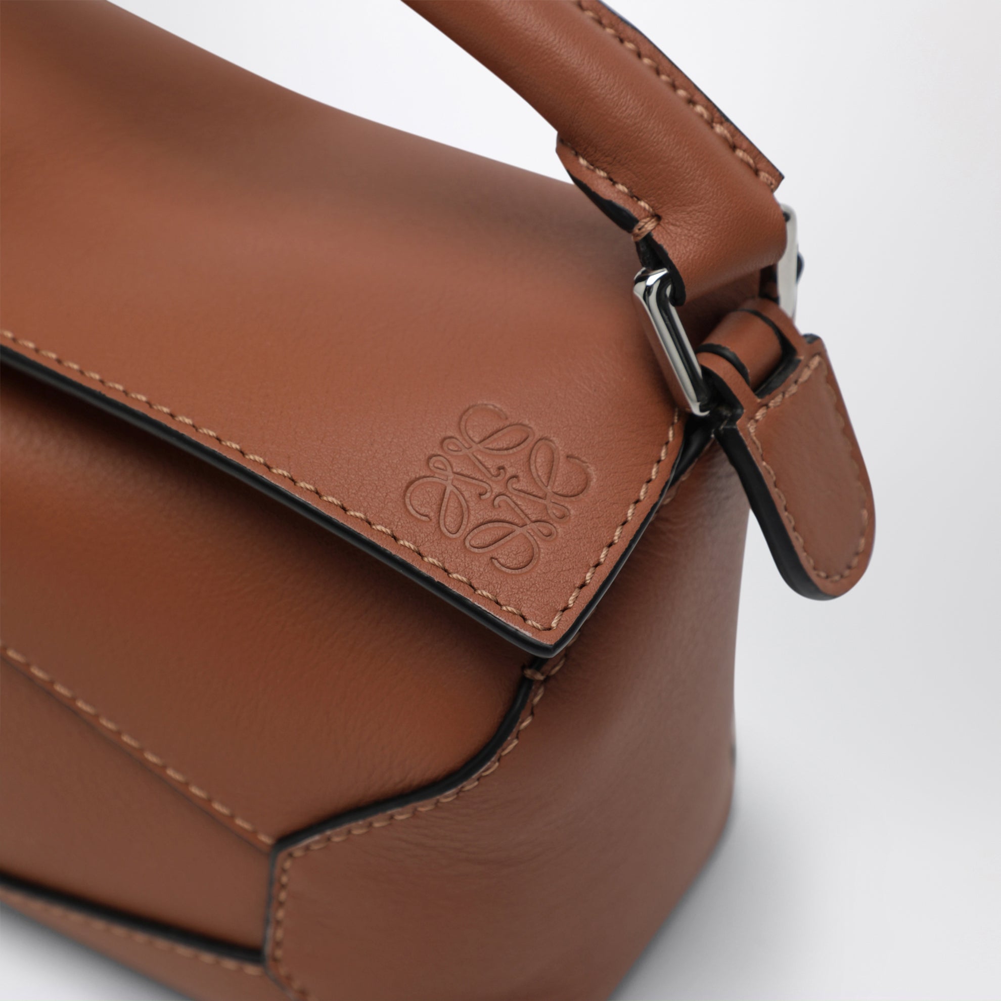 Borsa Puzzle Edge mini marrone in pelle granata