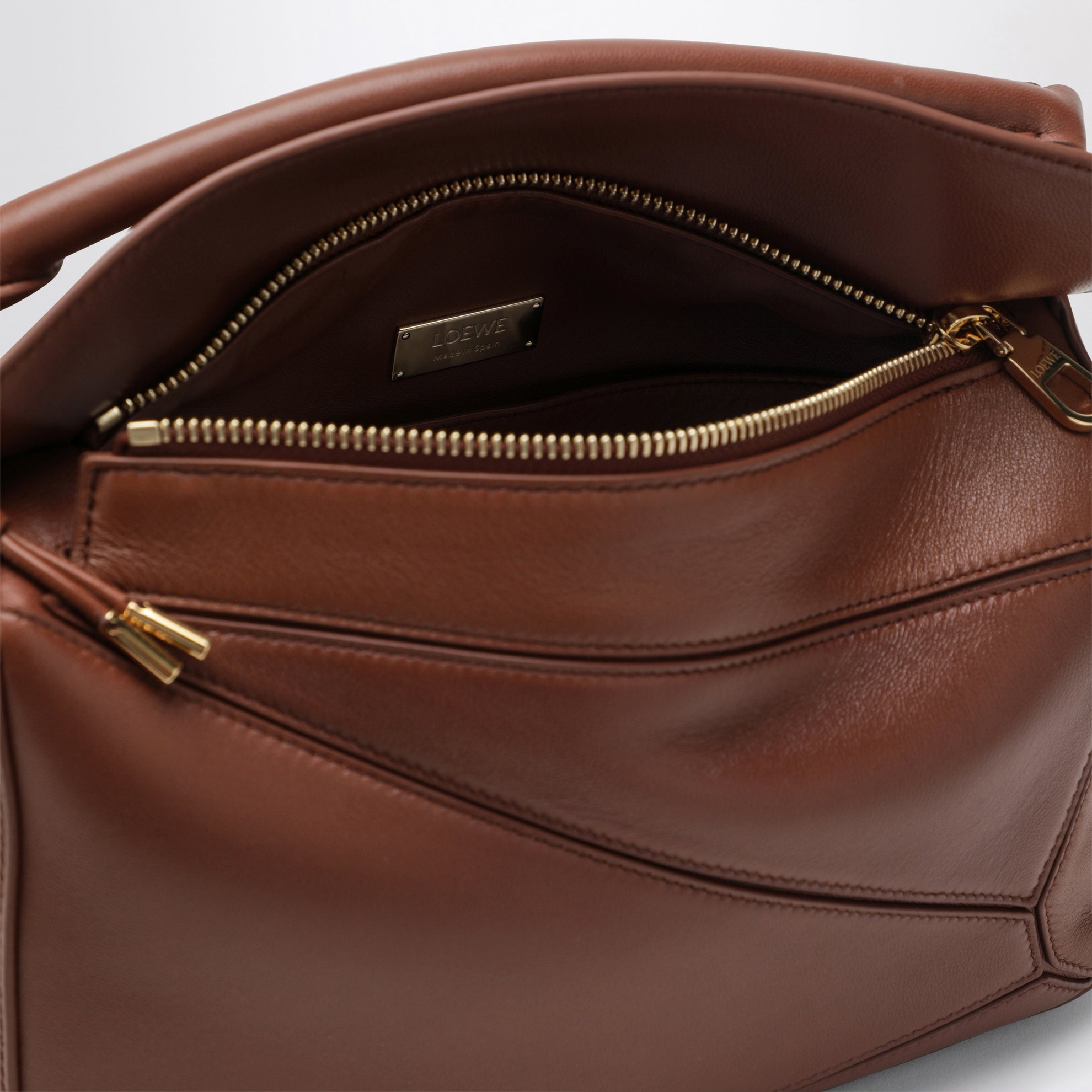 Petit sac Puzzle Featherlight en cuir nappa doré