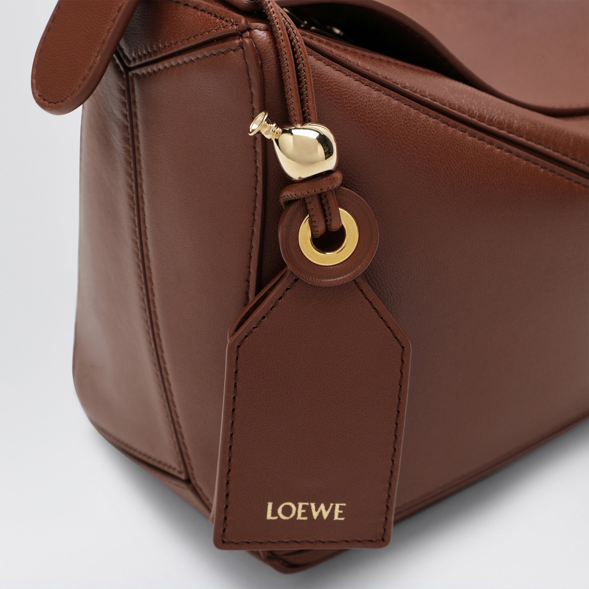 Petit sac Puzzle Featherlight en cuir nappa doré