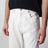 White trousers in regenerated denim