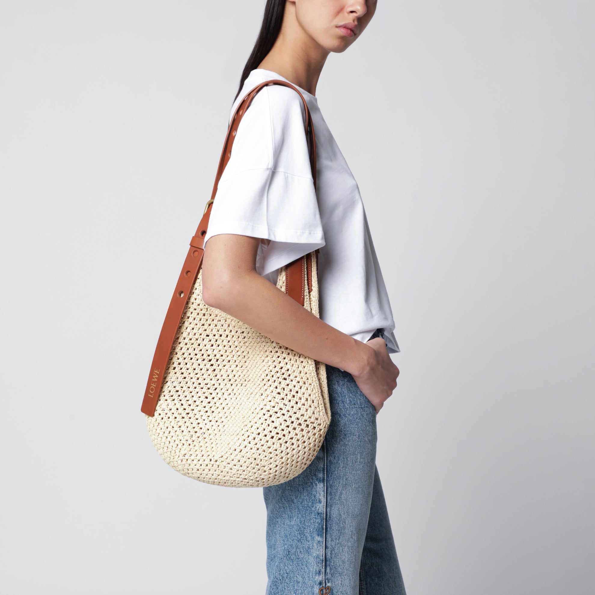 Small raffia and leather Punch Hole hobo bag