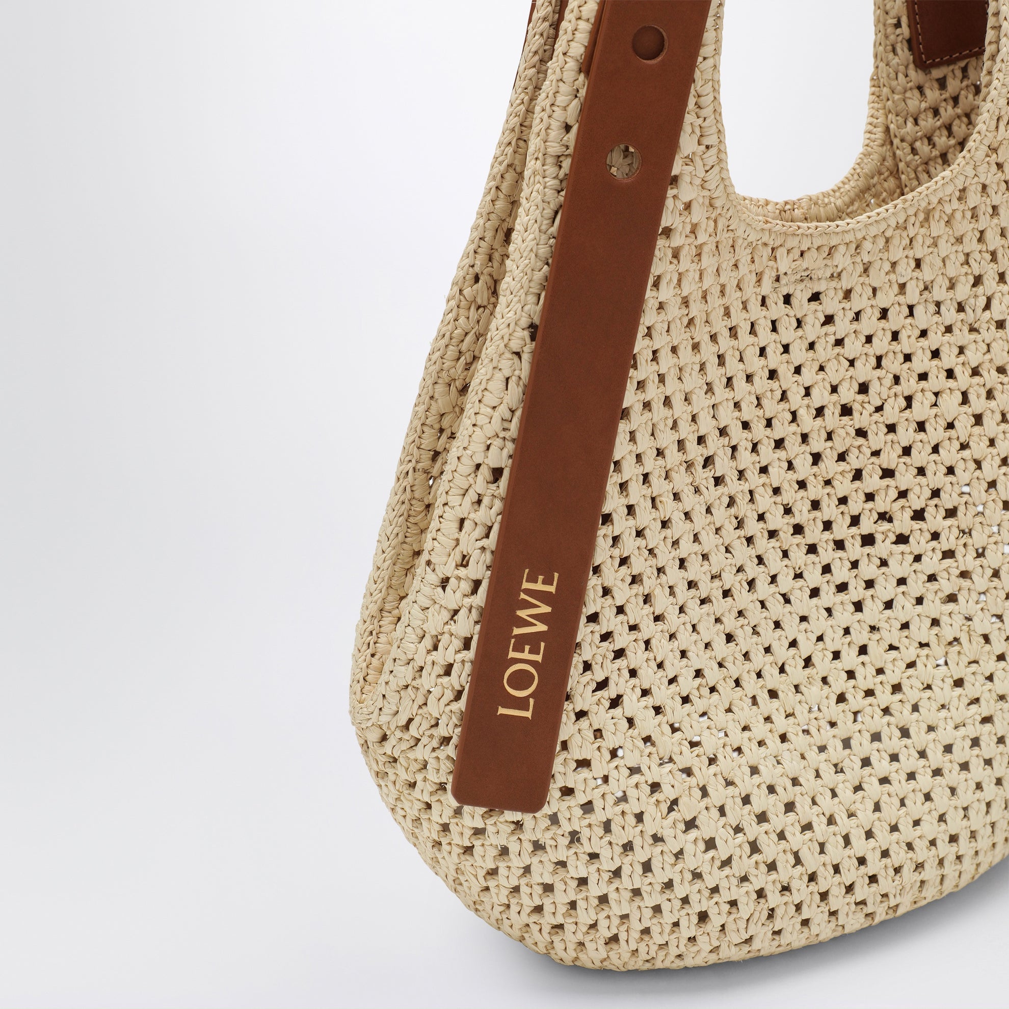 Small raffia and leather Punch Hole hobo bag