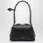 Small Le Teckel shoulder bag in black calfskin