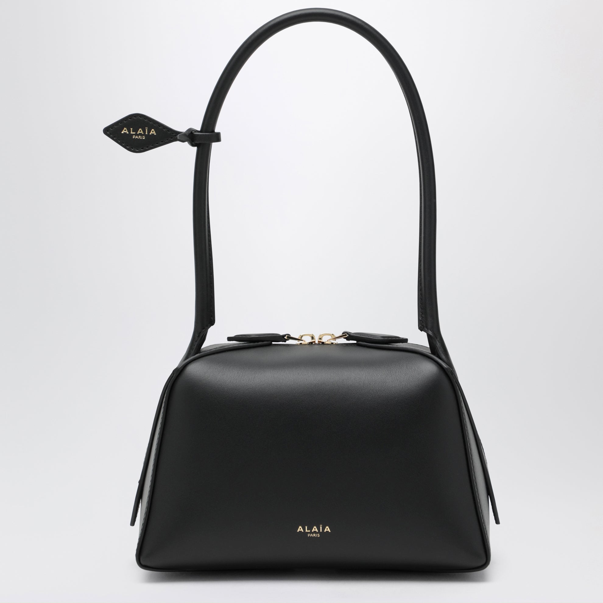 Small Le Teckel shoulder bag in black calfskin