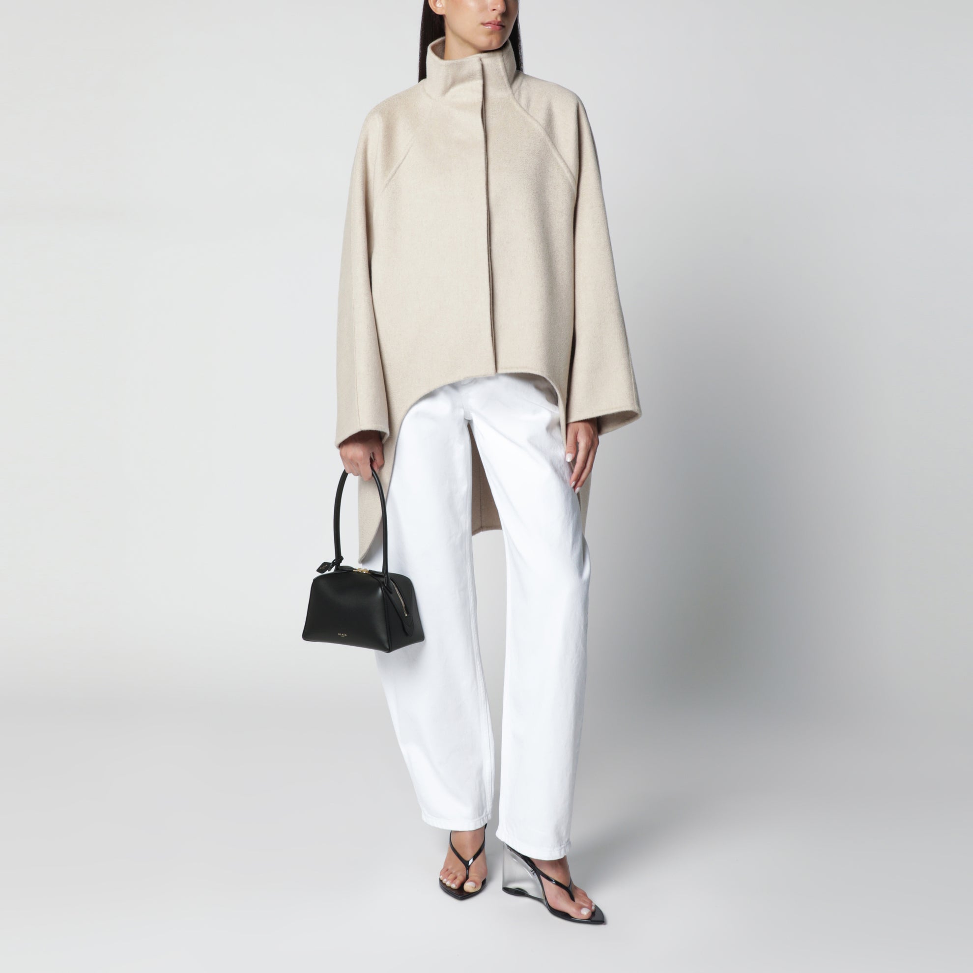 Small Le Teckel shoulder bag in black calfskin