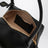 Small Le Teckel shoulder bag in black calfskin