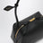 Small Le Teckel shoulder bag in black calfskin