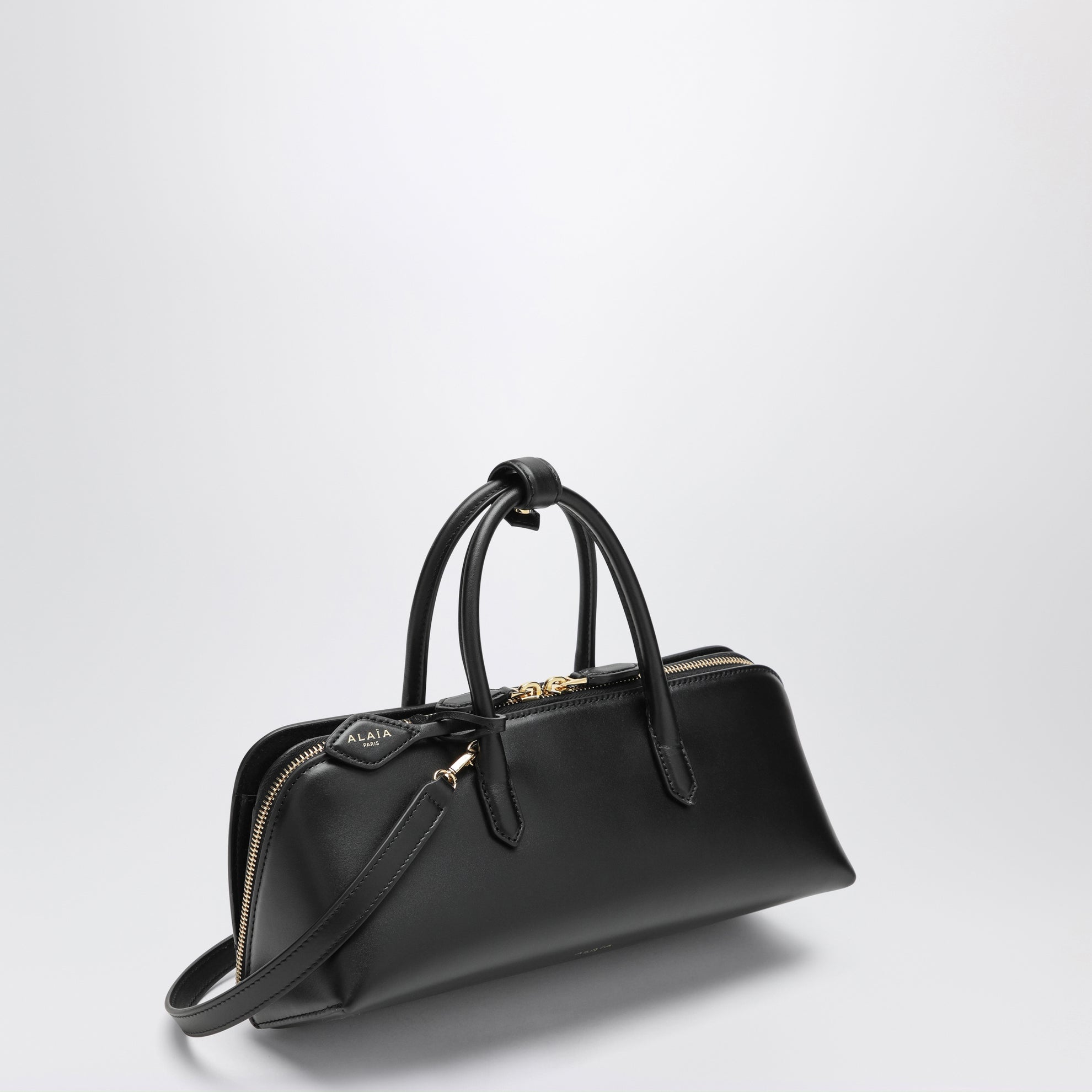 Small Delta bag in black box calf leather