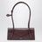 Le Teckel Small Tasche aus granatrotem Leder