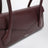 Le Teckel Small Tasche aus granatrotem Leder