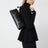 Le Teckel black goatskin bag