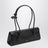 Le Teckel black goatskin bag