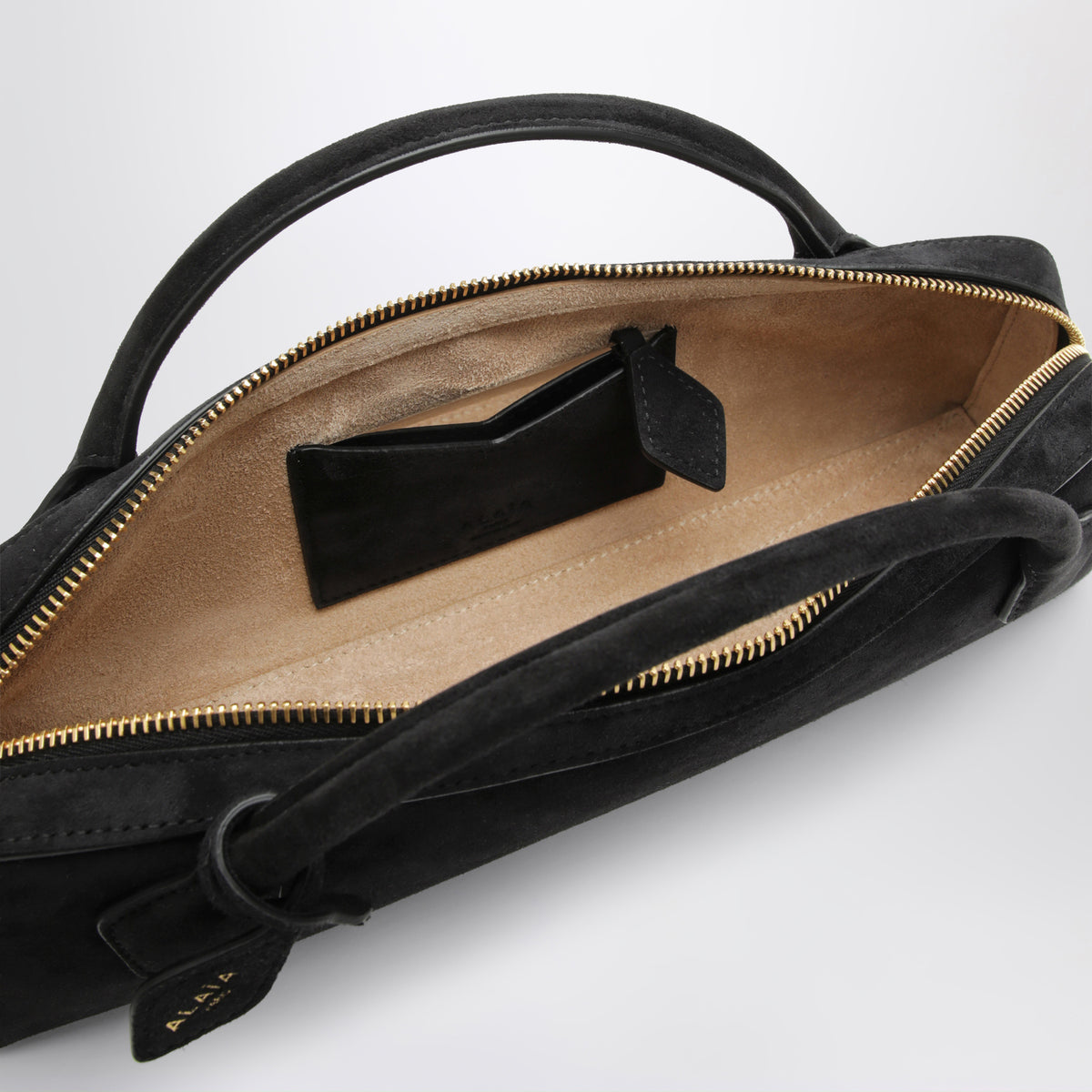 Pochette Le Teckel in pelle scamosciata nera