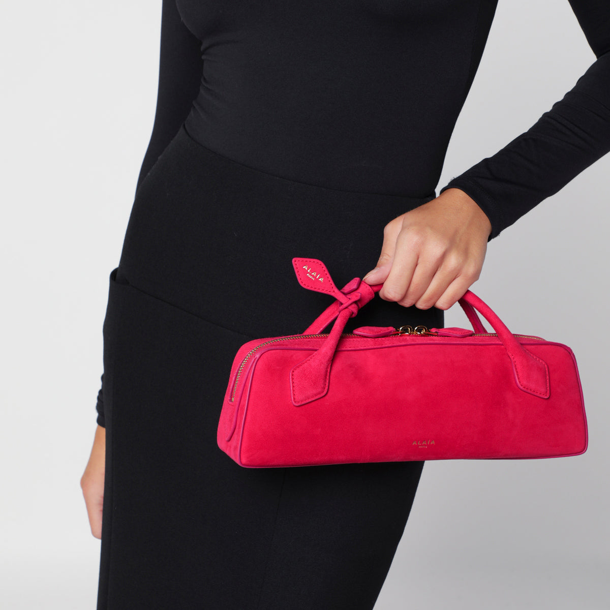 Le Teckel pouch in Dahlia pink suede