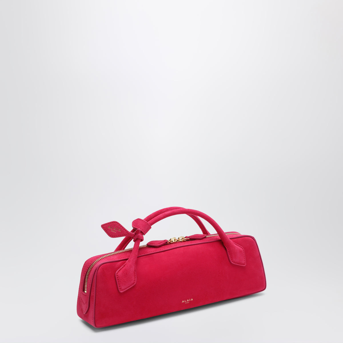 Le Teckel pouch in Dahlia pink suede