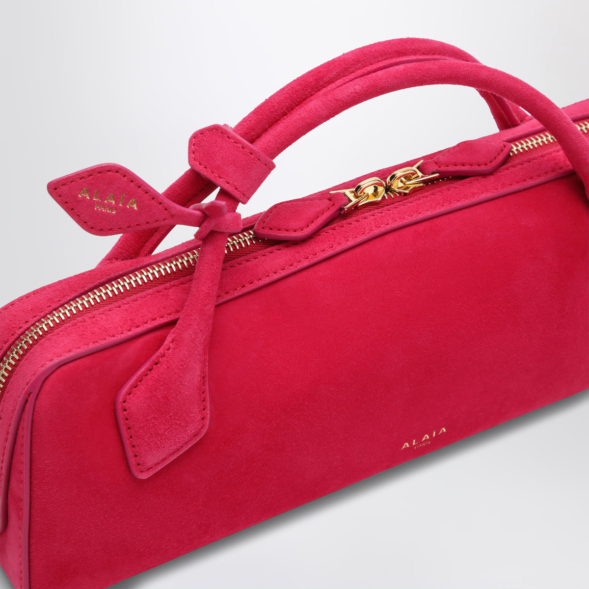 Le Teckel pouch in Dahlia pink suede