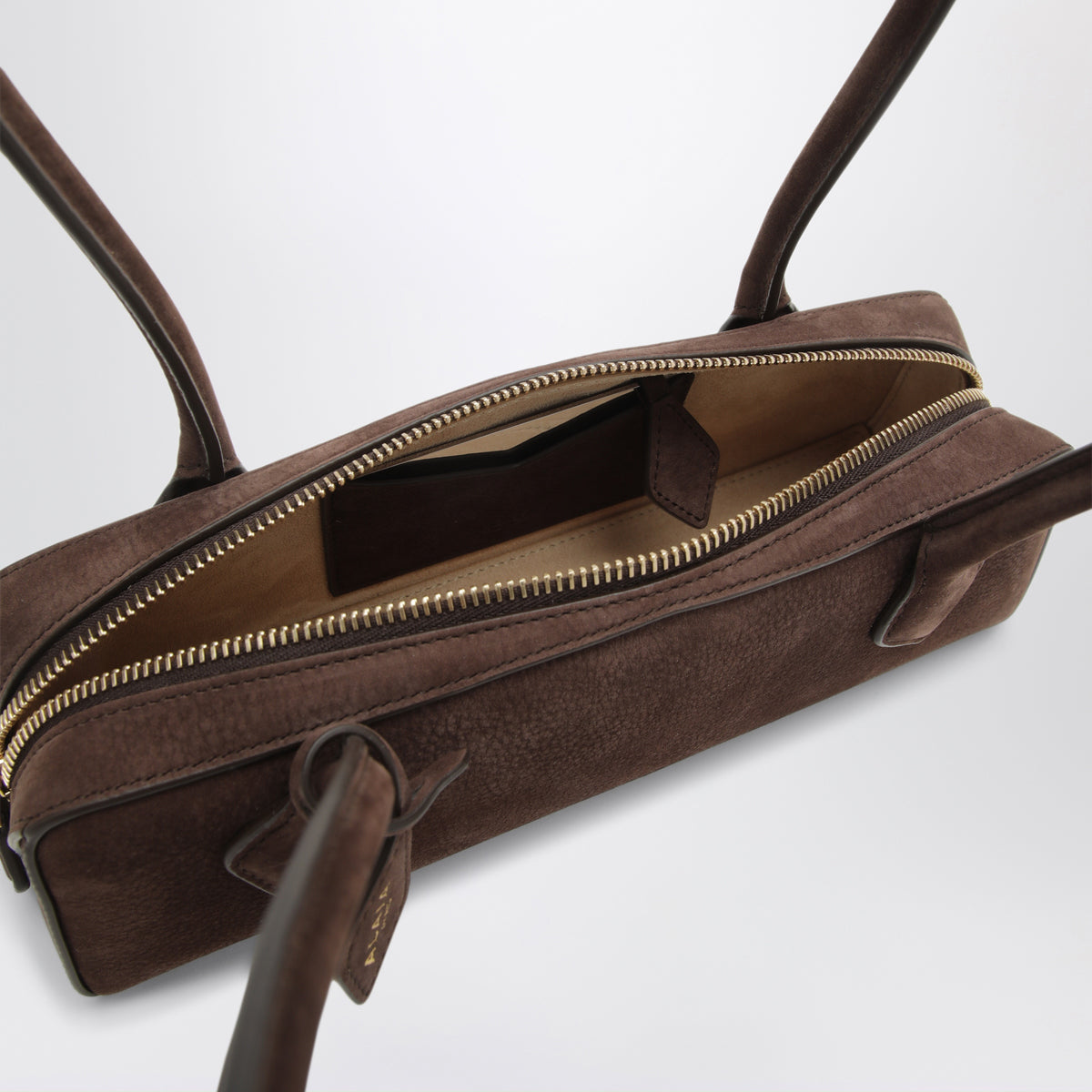 Le Teckel kleine braune Nubuktasche