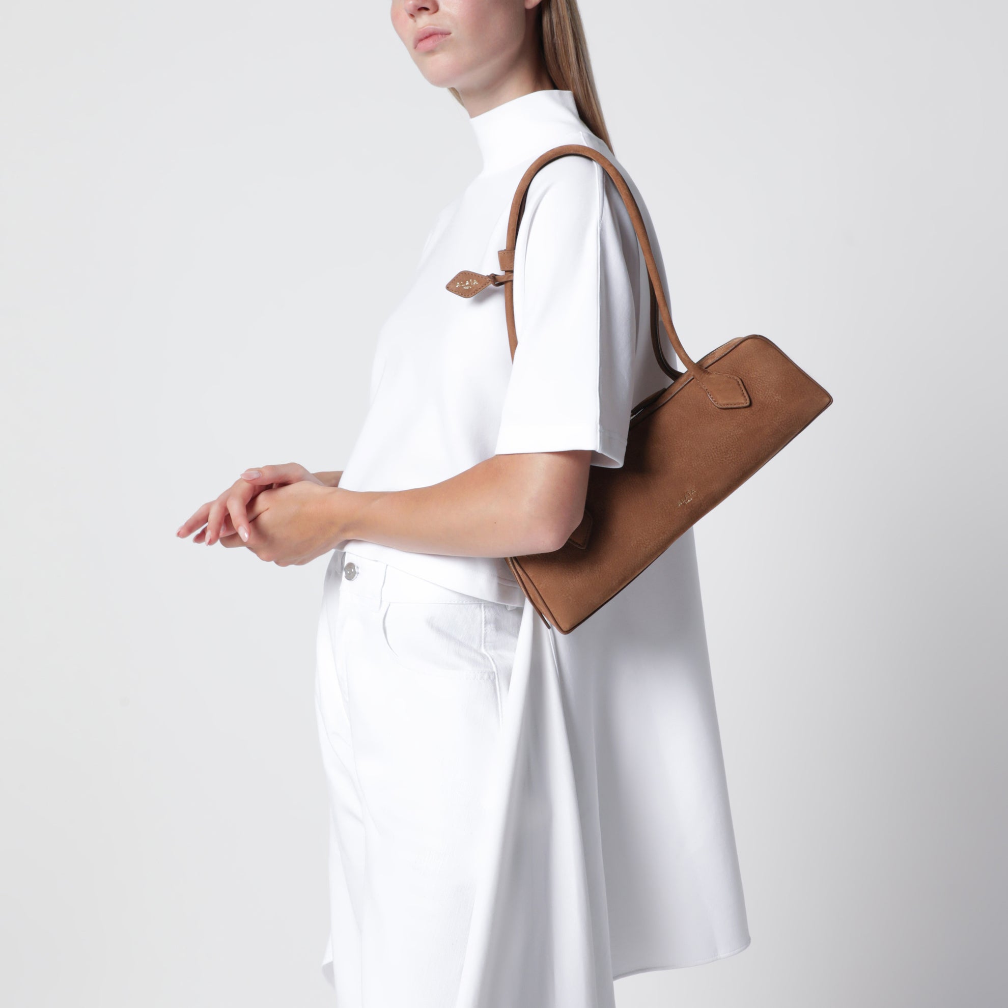 Le Teckel medium brown nubuck leather bag