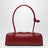 Medium red Le Teckel shoulder bag