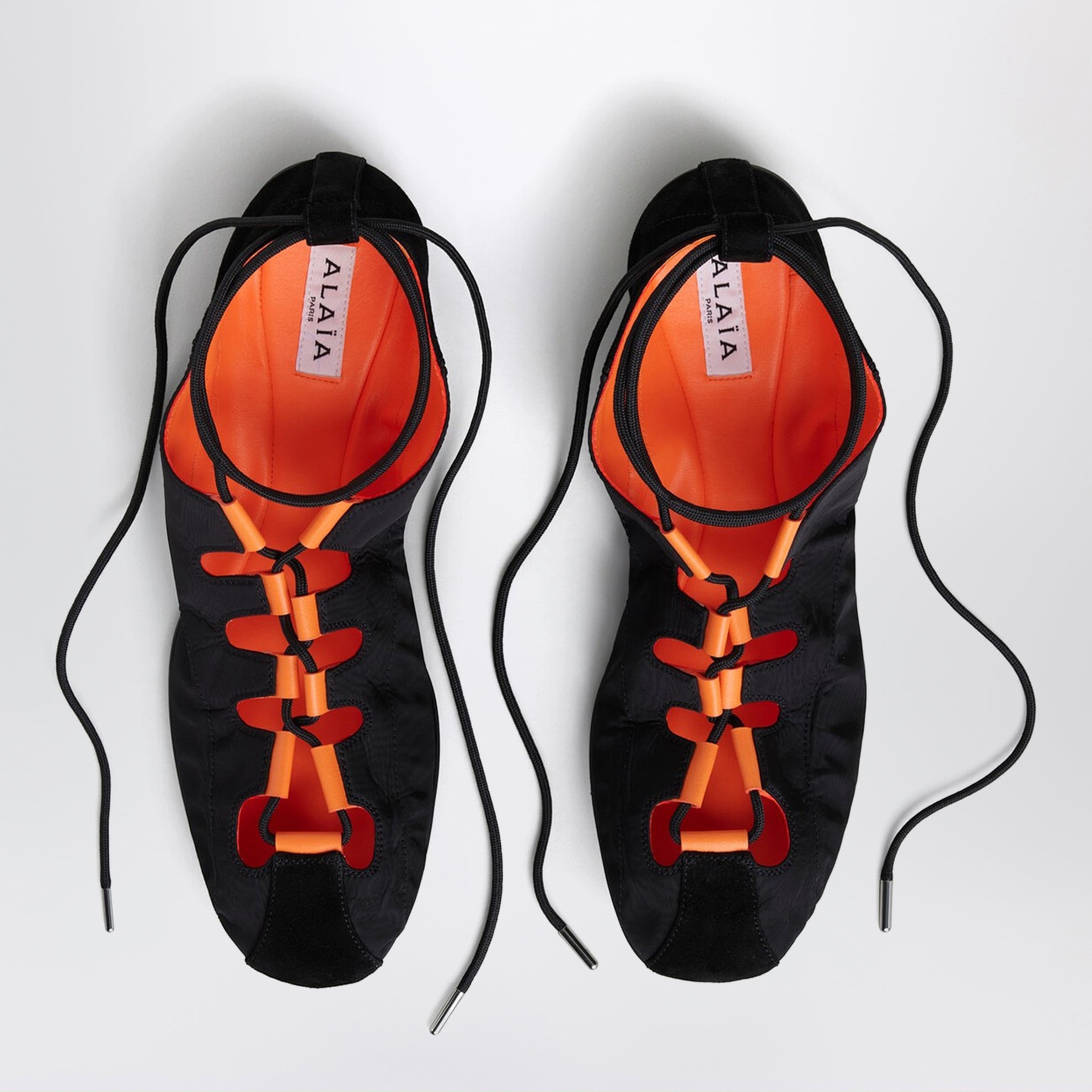 Ballerine stringate pieghevoli in nylon e suede nere
