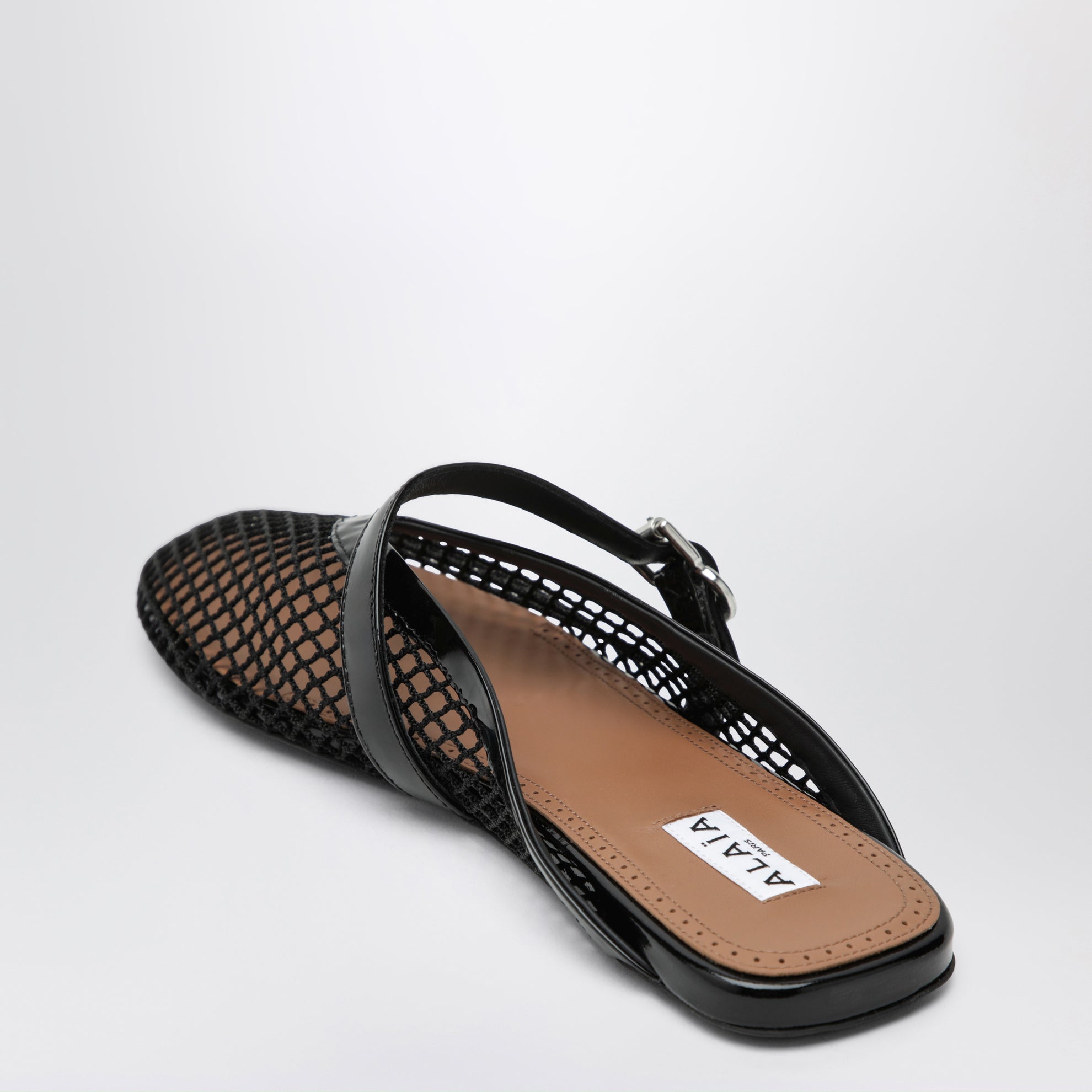 Flat mesh mules with buckle strap in black