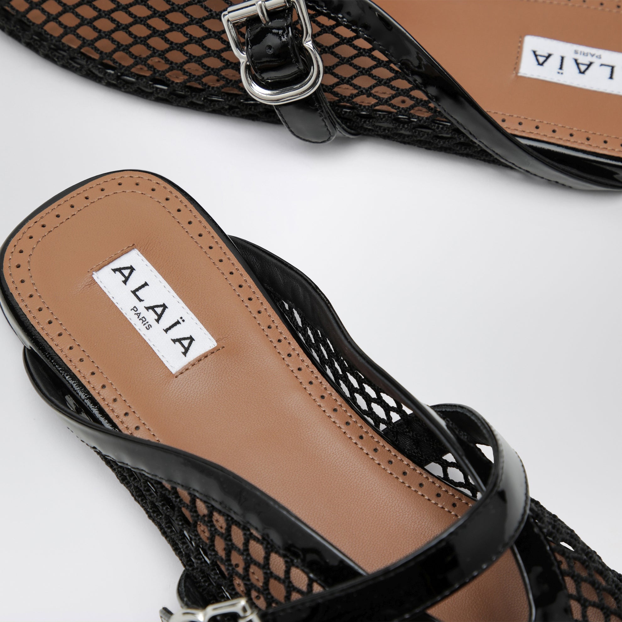 Flat mesh mules with buckle strap in black