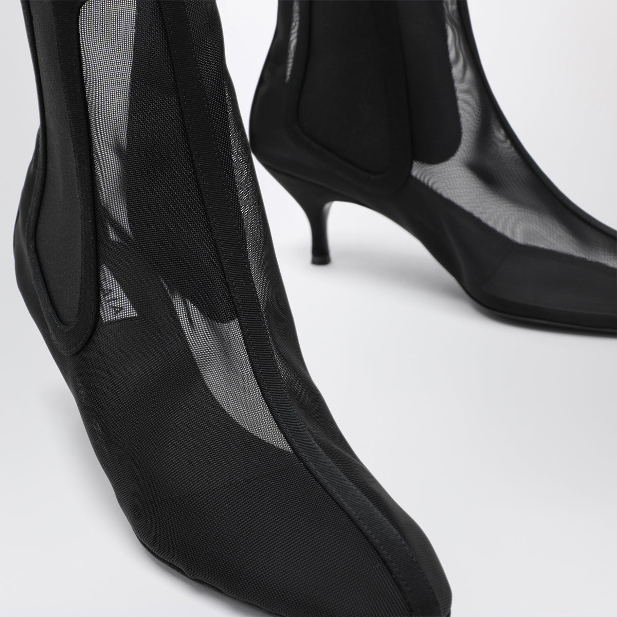 Black ankle boots in sheer mesh