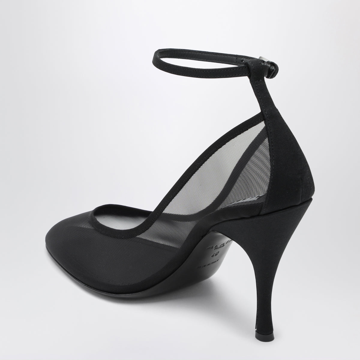 Black pumps in transparent mesh