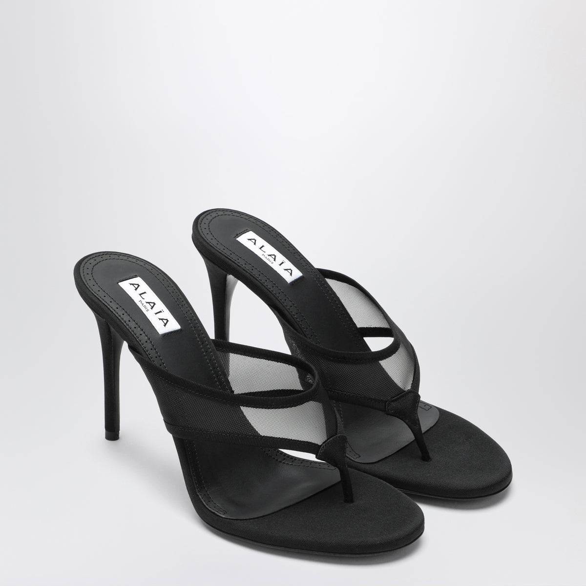 Black mesh flip-flop mules