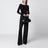 Body con spalle scoperte in maglia a coste nero