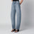 Low-rise curved-leg raw denim jeans in blue