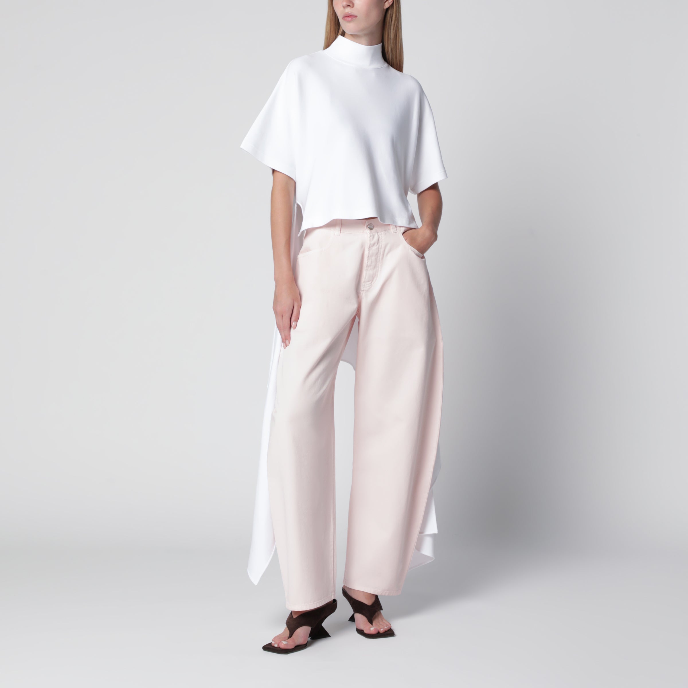 Alaïa Rounded high-rise cotton denim jeans in pale rose | TheDoubleF