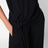 Full jumpsuit with a belt at the waist