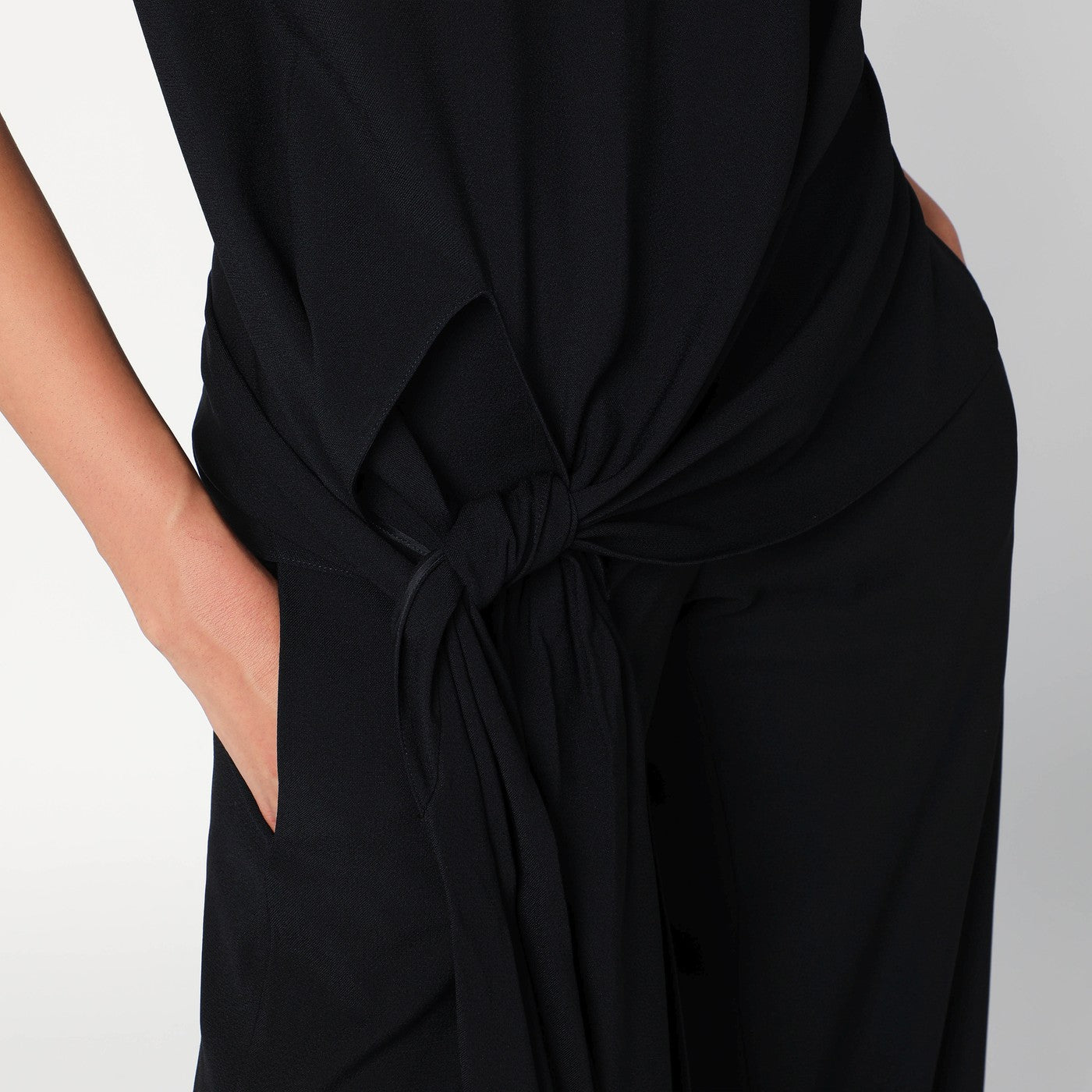 Full jumpsuit with a belt at the waist