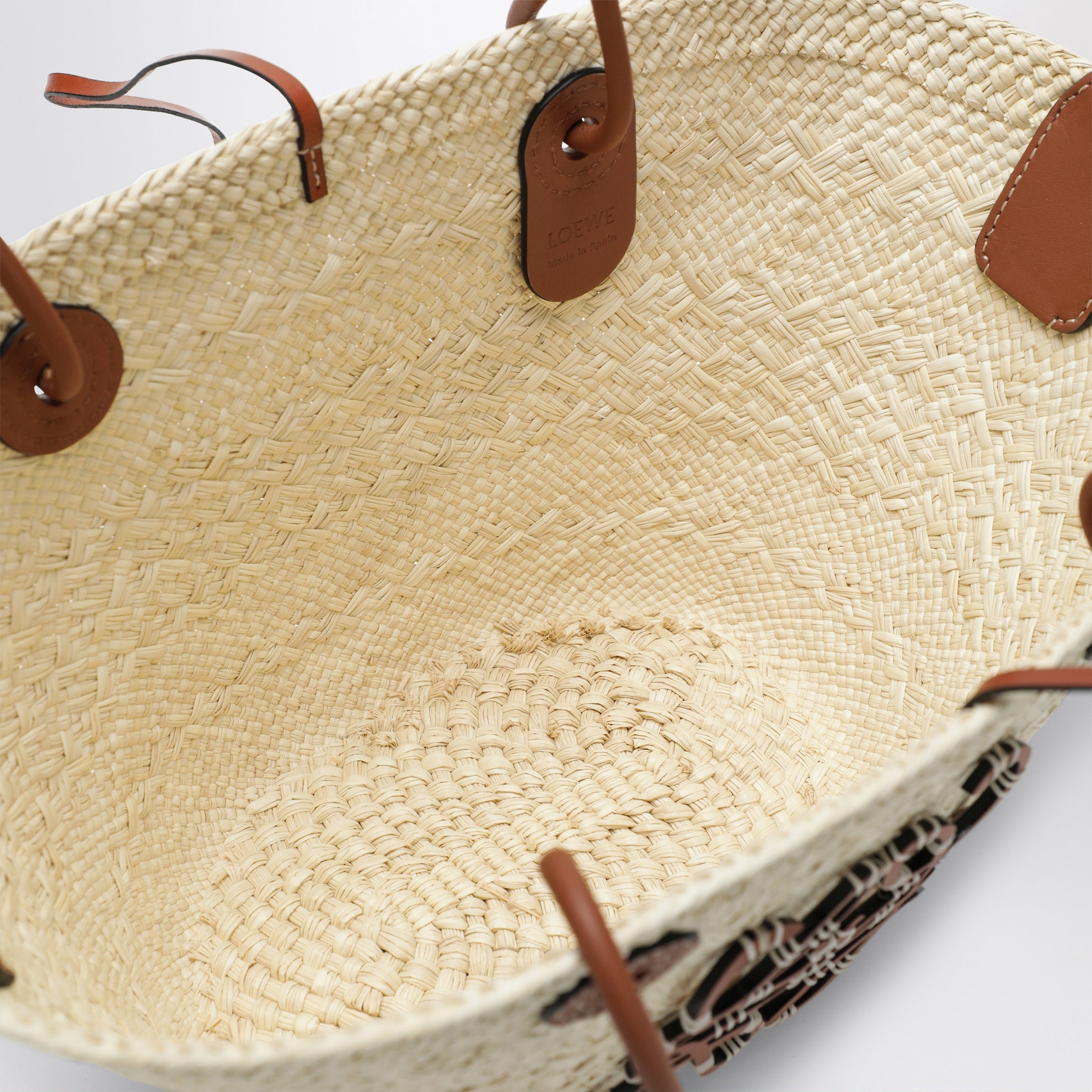 Small Anagram basket bag in iraca palm and leather