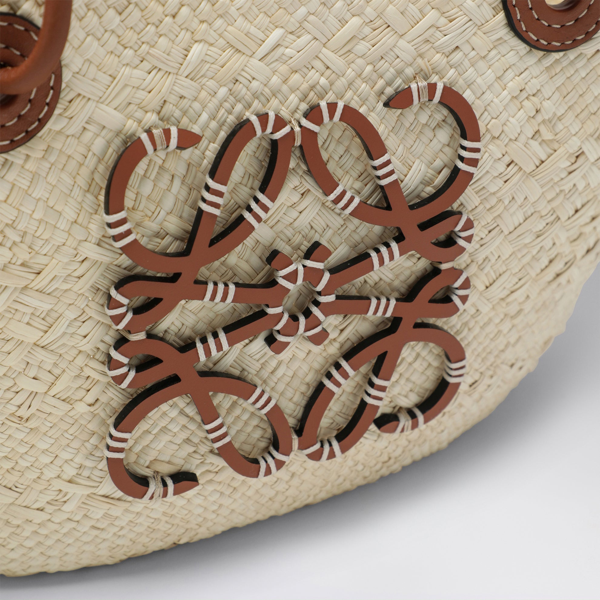 Small Anagram basket bag in iraca palm and leather
