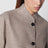 Beige melierte Jacke aus Wolle