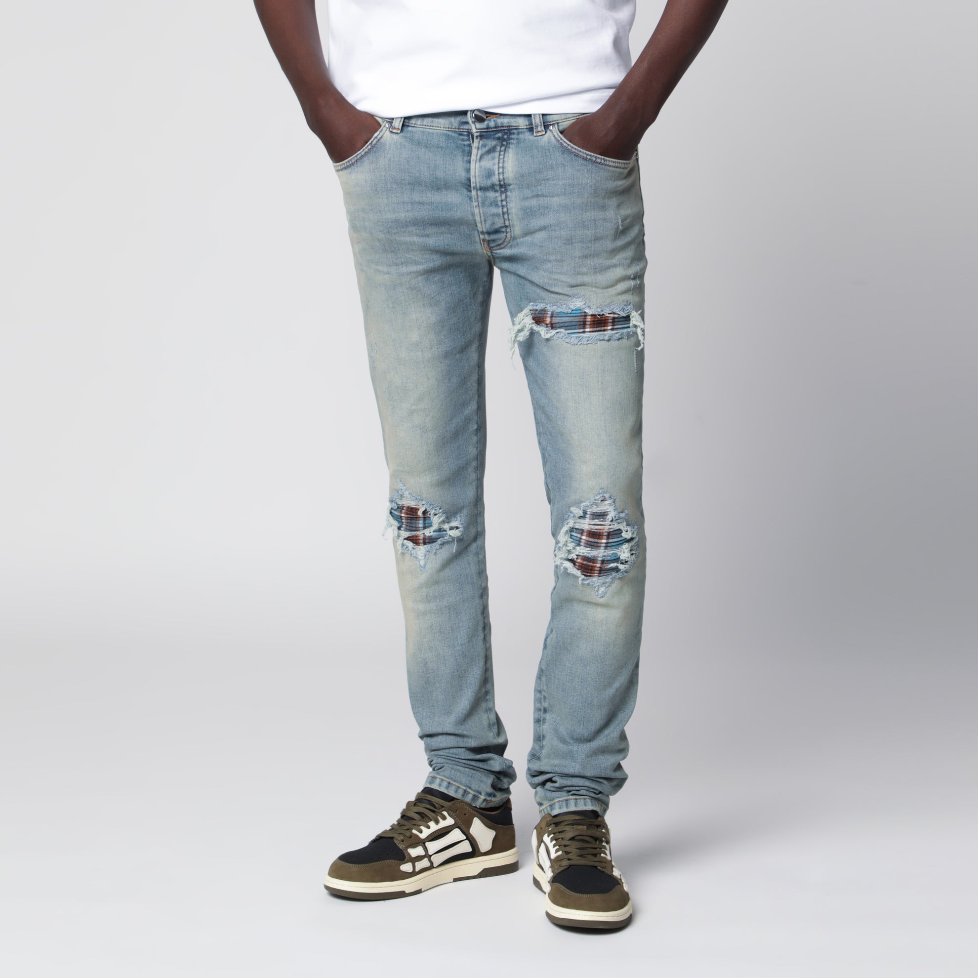 MX1 distressed flannel-patched jeans in medium indigo