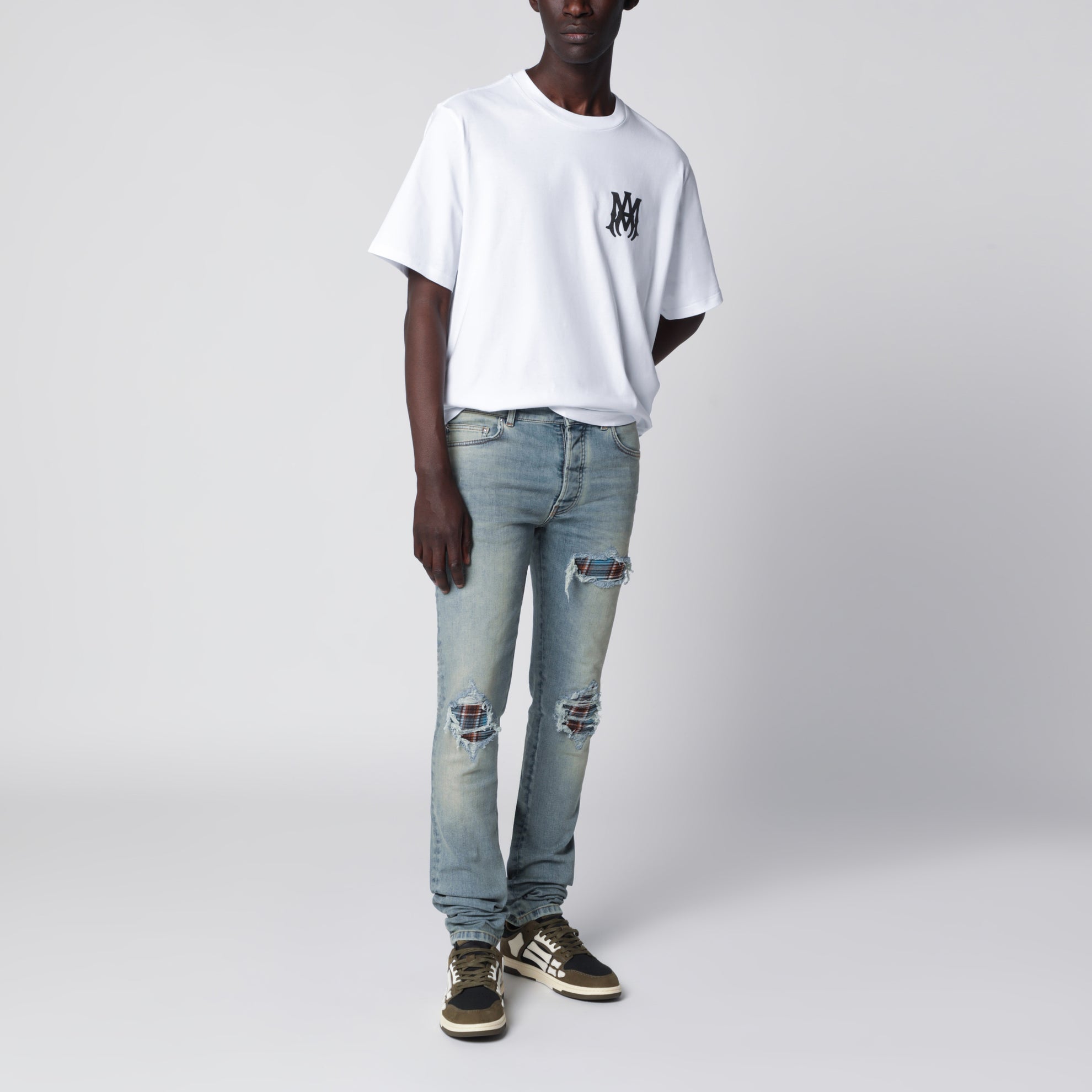 MX1 distressed flannel-patched jeans in medium indigo