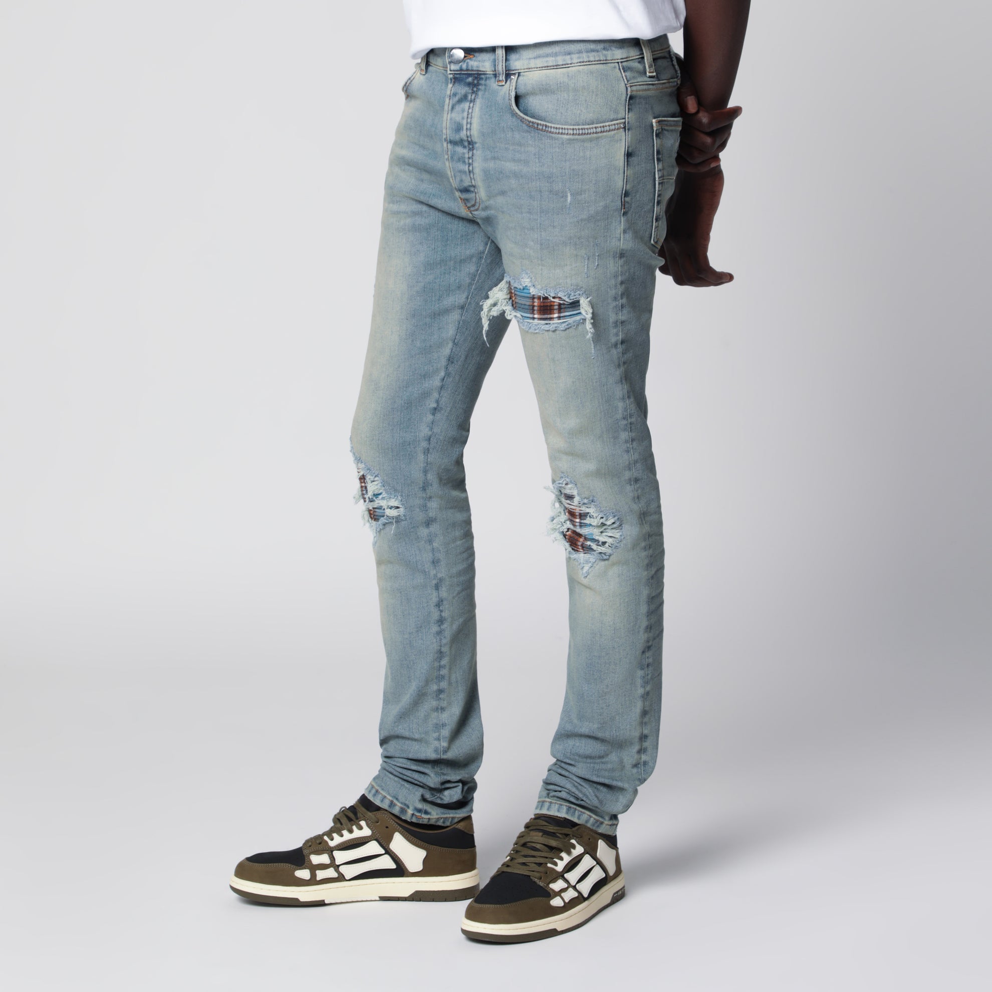 MX1 distressed flannel-patched jeans in medium indigo